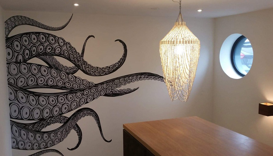 Octopus printed wall art for Hotel in Falmouth. Produced by sign maker in Cornwall 