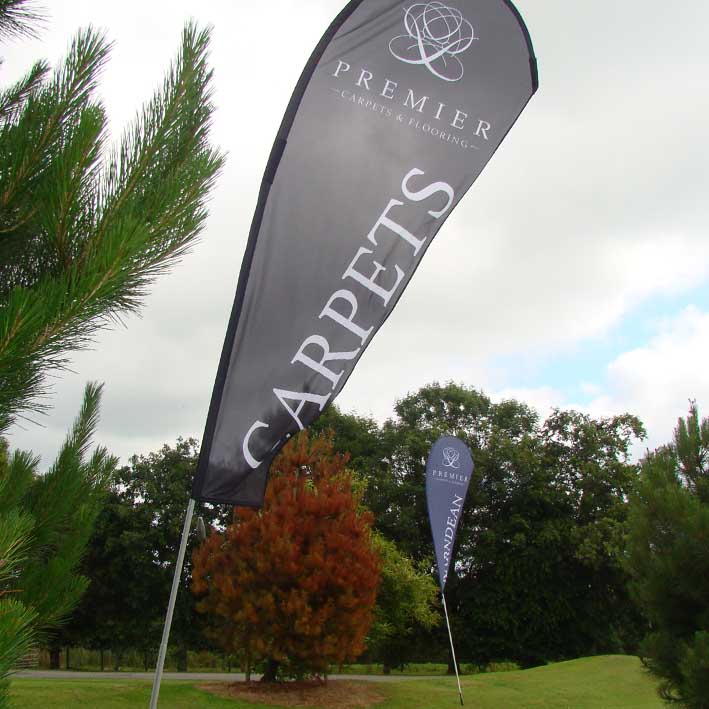 Printed feather flags by More Creative at golf course