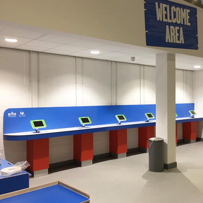 Welcome desk produced with IPad stands for Carterton Leisure Centre