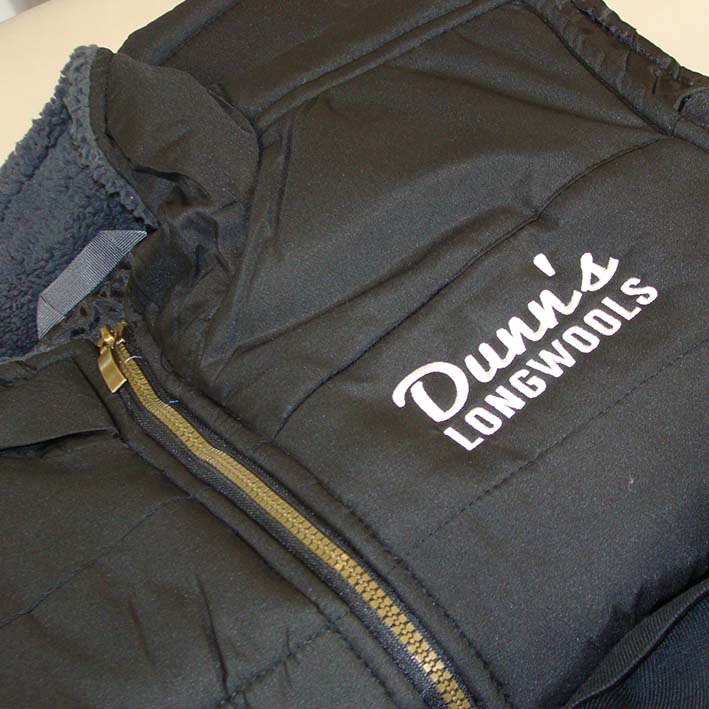 Stitched logo on bodywarmer and jackets