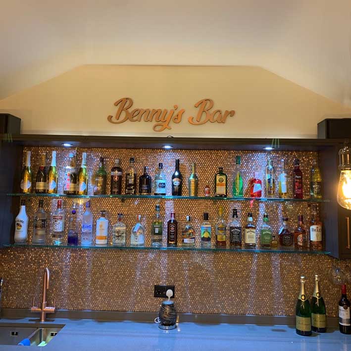 Bennys Bar signage cut from copper lettering
