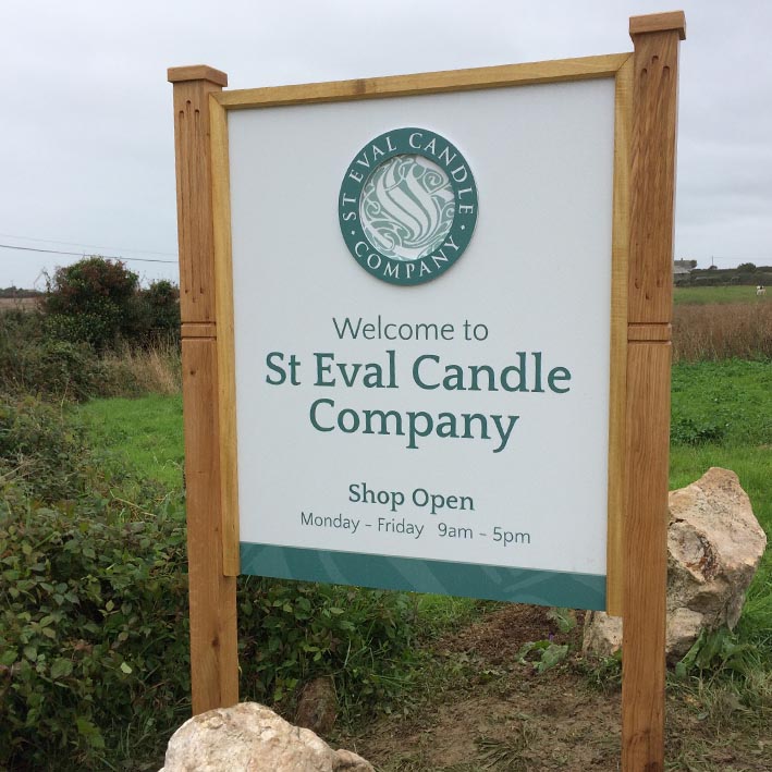 St Eval Signs Cornwall Oak post sign for candle company with shop opening times
