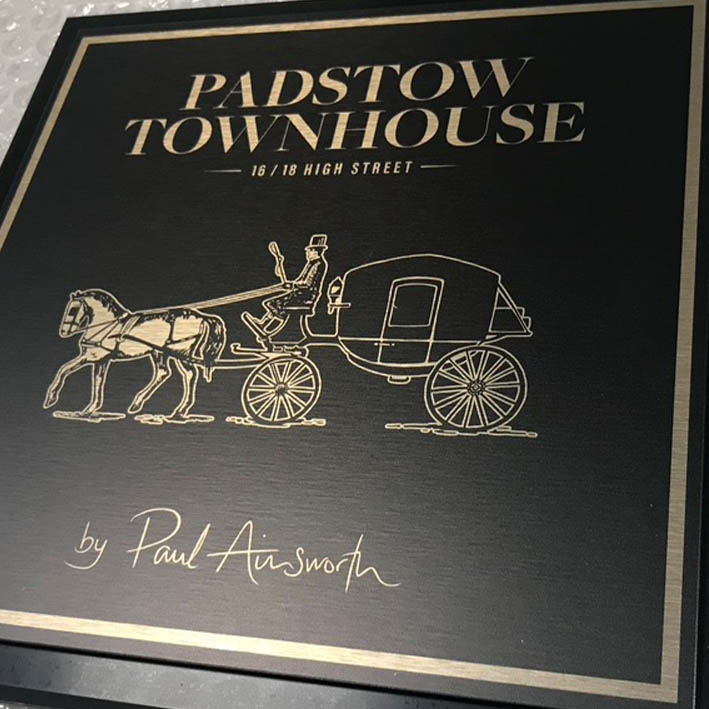 Padstow heritage signage for town house